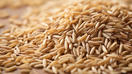 Fototapeta premium Pile of brown rice grains, close-up view.