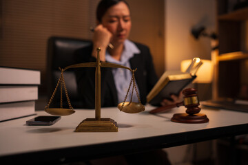 Lawyer female lawyer is discussing a contract agreement