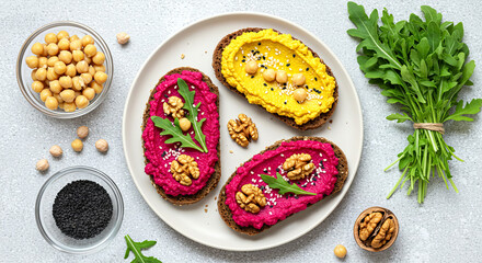 Beet and Yellow Hummus Toasts with Walnuts and Arugula