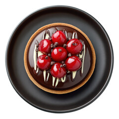 Glossy cherry tart with chocolate ganache, white chocolate drizzle, and cocoa nibs on black plate, delicious dessert