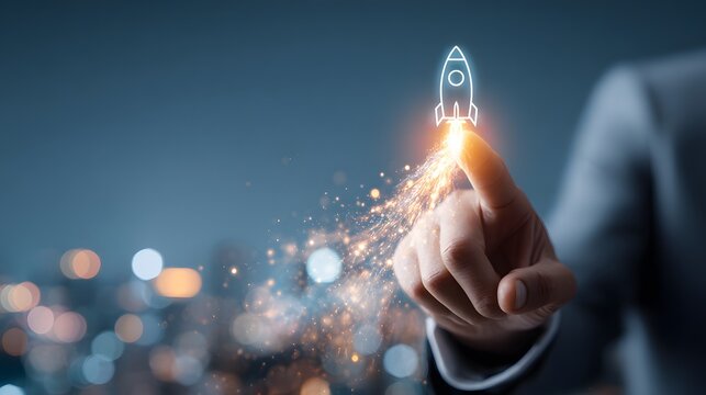 Conceptual image of a hand launching a rocket, symbolizing innovation, growth, and successful endeavors in business and technology.