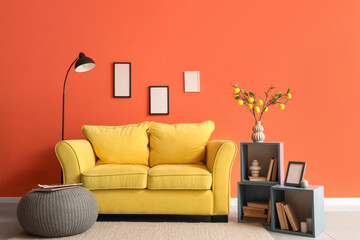 Interior of stylish living room with yellow sofa, lamp and bookshelves