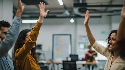 Diverse team celebrating success with a high five in a modern office environment - Powered by Adobe