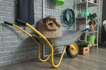 Trolley with sack bag in gardener's workshop