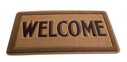 Welcome mat for home entrance with textural design in brown tones for inviting decor accent piece