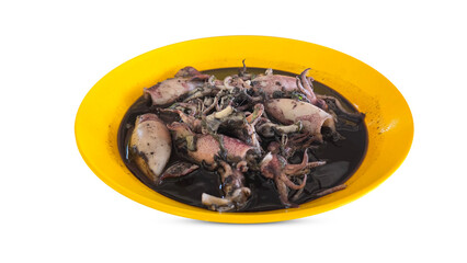 Stewed squid in ink served in yellow bowl