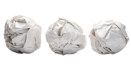 Three crumpled white paper balls isolated on transparent background show creativity and frustration.