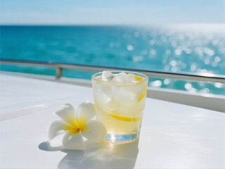 Refreshing Lemonade on Pristine Yacht Deck with Frangipani Flower – Glittering Turquoise Ocean & Summer Sky Backdrop