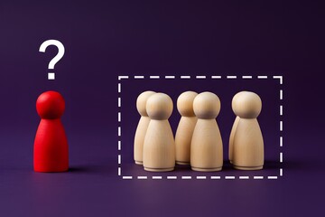 There is no place for the red man in the group. Social isolation, Exclusion and discrimination.