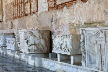Roman sarcophagi at the Camposanto Monumentale (Monumental Cemetery) in Pisa, Italy.
