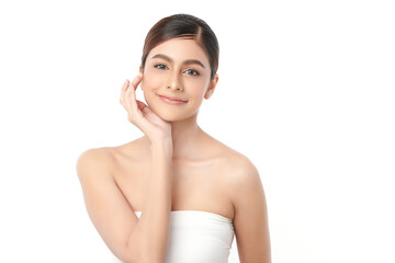 A beautiful young Asian woman with clean, fresh skin against a white background. Skincare, facial...