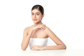 A beautiful young Asian woman with clean, fresh skin against a white background. Skincare, facial...