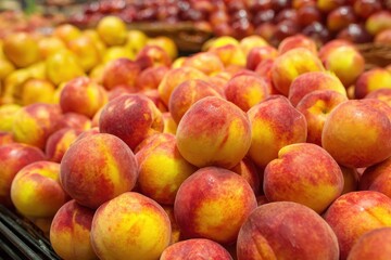 Large gorgeous peaches are available at the store