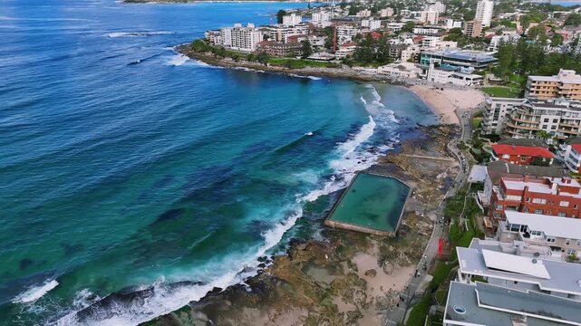Spectacular Cityscape and Seascape Views -flying high over Cronulla Beach, Park and Rockpools, turning towards North Cronulla Beach and seawall, on a beautiful day, but with some rain coming.