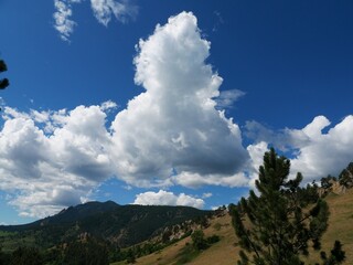 Dramatic Cumulus Clouds Over Sanitas Valley Trail in Boulder, Colorado