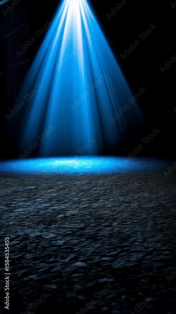 Poster dramatic stage lighting casting blue spotlights on a dark surface, creating a focal point for presen