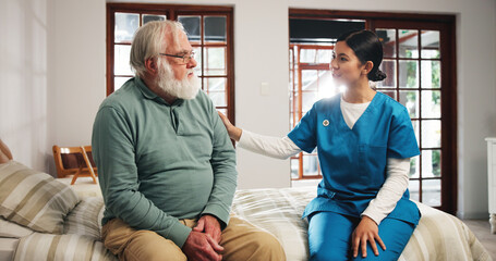 Comforting, talking and nurse with senior man in bedroom for support, help and care in nursing...