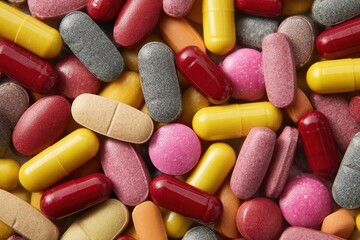 various medications in tablet pill and capsule form mixed together
