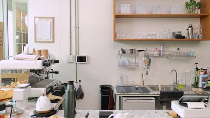 Senior entrepreneur prepares coffee with steady hands, dressed in apron. cafe professtional bar reflects a small business owner identity hard work, skill, freedom retired occupation working lifestyle