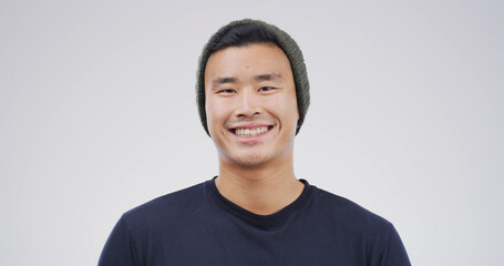 Portrait, Asian man or student with smile in studio for education, scholarship and college. Space,...