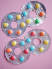 pills and capsules of colorful chocolate candy