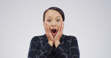 Portrait, woman and shocked reaction in studio for hearing gossip, bad news and fake rumor. Person,...