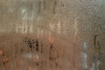  Condensation on glass, Perfectly spherical water droplets dot foggy surface. condensation on window. wet glass abstract background for design.