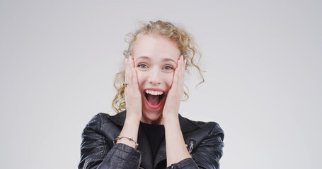 Girl, surprise and wow with in studio portrait for deal, good news and shock on white background....
