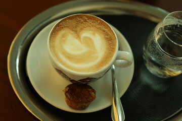 cup of cappuccino in a cafe
