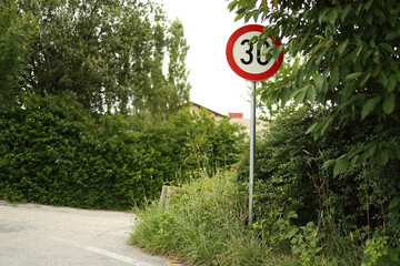 Road sign speed limit up to 30 km. Speed limit sign on roads.
