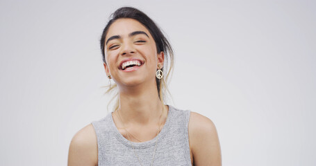 Laughing, happy and portrait of woman in studio with mockup space for comedy joke with humor....
