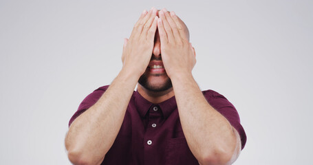 Cover eyes, surprise and man in studio, announcement and secret on white background. Person, mockup...