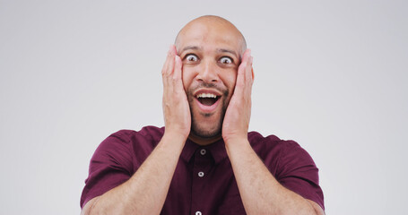 Portrait, surprised and mind blow with man in studio of announcement, good news and hearing secret....