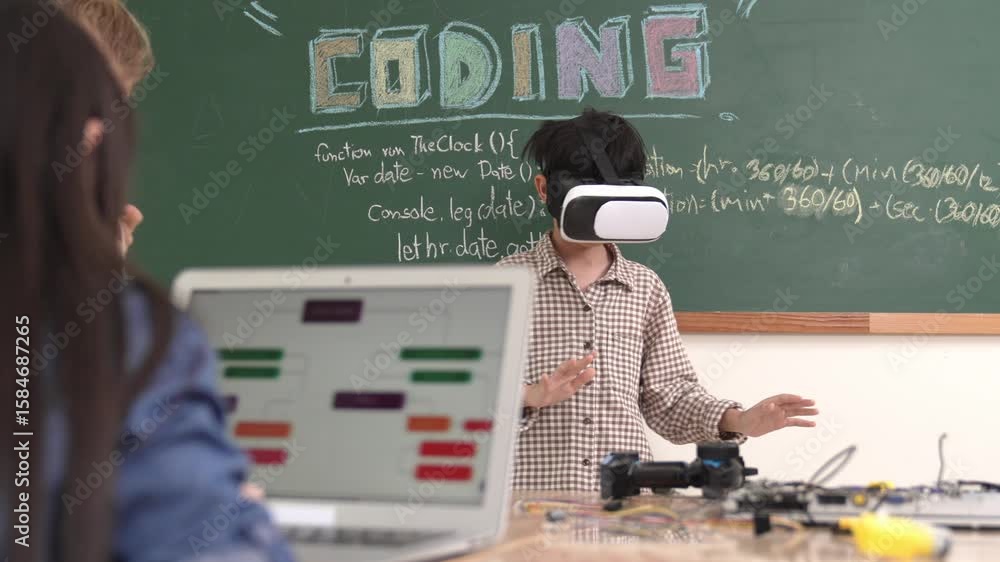 Poster boy wearing vr headset to enter metaworld at table with electronic board while girl coding system. g