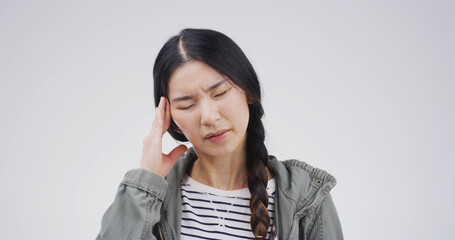 Tension, pain and girl with headache in studio from mental health fatigue, stress and vertigo....