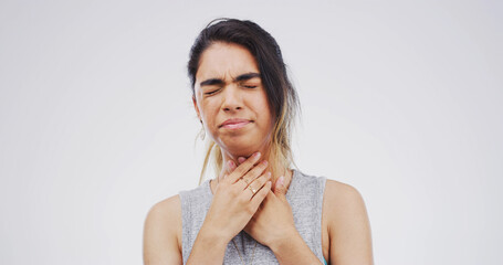 Pain, hurt and woman with sore throat on studio space for cold, flu or virus symptoms. Asthma,...