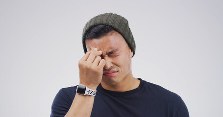 Stress, headache and man in studio with pain, brain fog and vertigo on white background with space....
