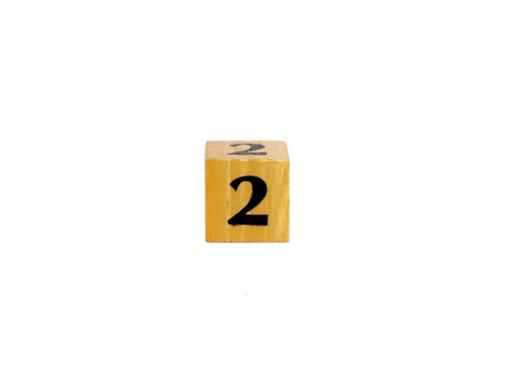 Wooden Number 2 Block Standing on Glossy Surface with Copy Space