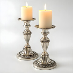 pair of shabbat candles in elegant candlesticks