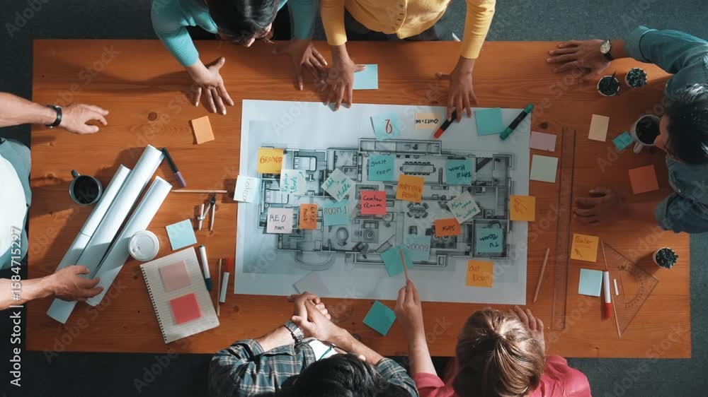 Poster top down view of smart business people shaking hands and making a contract. aerial view of architect