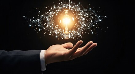 Illuminating innovation lightbulb on hand representing business idea and creative network connection concept