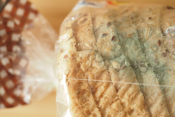 mold bread in a packet on a table 