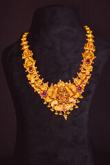 Traditional Pure Gold ornaments with marvelous stones and intricate designs. Temple Gold Jewellery....