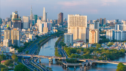 Obraz premium Panoramic view of Saigon, Vietnam from above at Ho Chi Minh City's central business district. Cityscape and many buildings, local houses, rivers. Landscape concept.