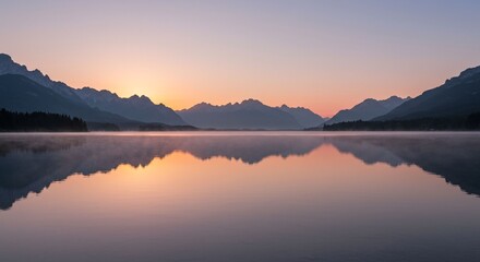 Naklejka premium Sunrise reflection on calm mountain lake