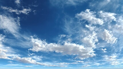 Obraz premium A beautiful expanse of blue sky filled with fluffy white clouds, perfect for evoking feelings of tranquility and peace.