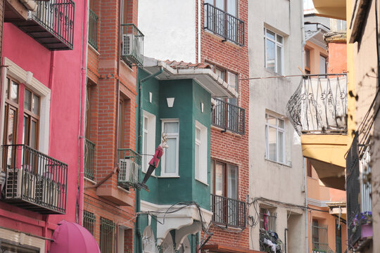 turkey istanbul 20 marh 2025. Colorful buildings lining a narrow street in the city