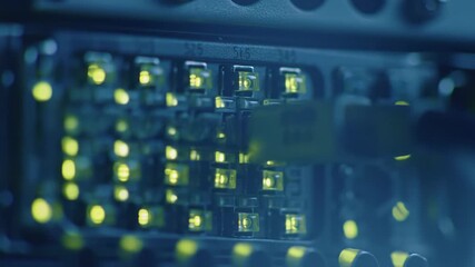 Close-up of a server rack with blinking LED lights, representing data center technology, cloud computing, cybersecurity, IT infrastructure, digital data storage, modern data management - Powered by Adobe