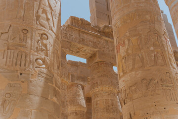 Hieroglyphics decorating columns in the mortuary temple of ramses iii at medinet habu