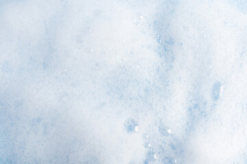 Chic foamy surface of liquid soap, gel, washing powder with bubbles. A copy of the space. Mockup for Spa Cosmetics Product, Detergents